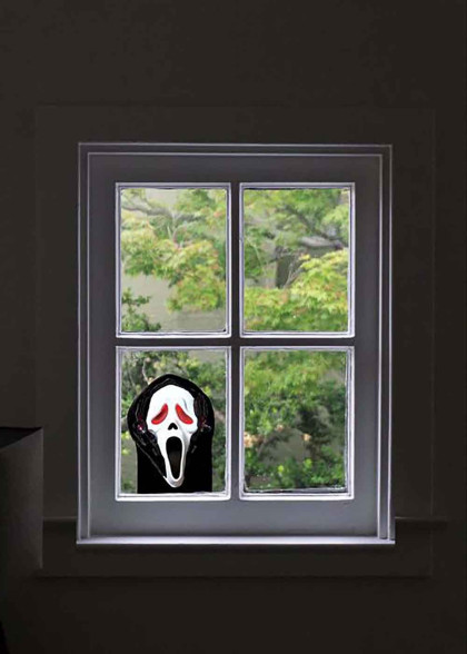 Обличчя привида на вікно